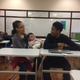 Ryan Moten, a freshman at Vaux, with his grandmother and baby sister, after he gave a school presentation about his plans for the future.